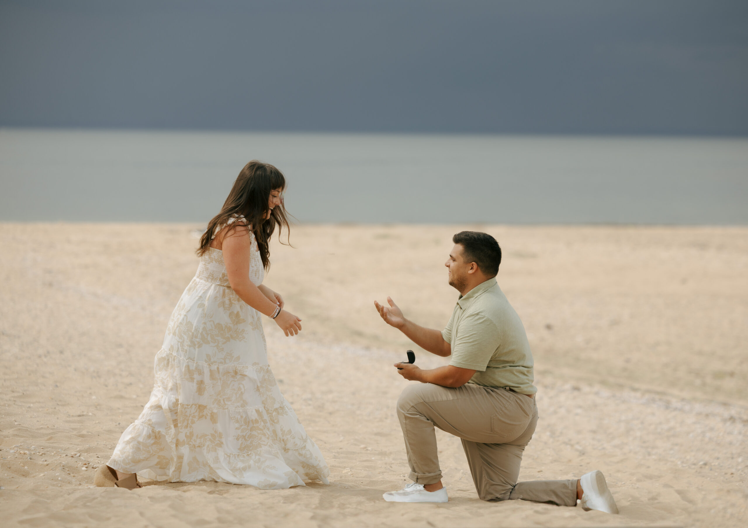 Photo of a man proposing to his fiance!